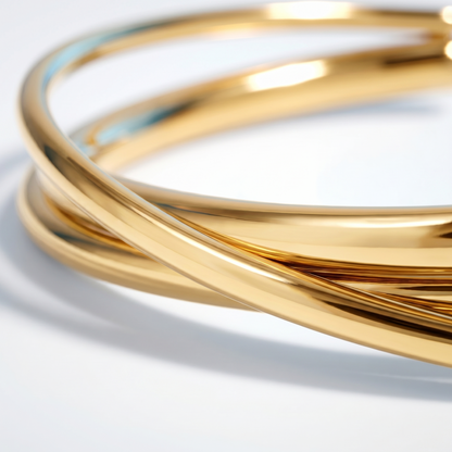 Bangle Rigido Crossover Oro 18K - vista dall'alto top-down - UpperEast Jewels