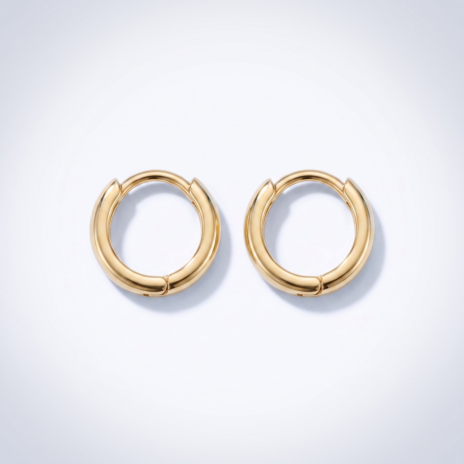 Orecchini Huggie Lisci Oro 18K