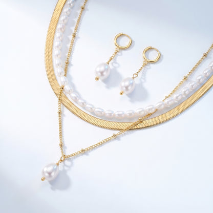 Set Dolce Vita Perla — Collana + Orecchini Oro 18K - vista dall'alto top-down - UpperEast Jewels