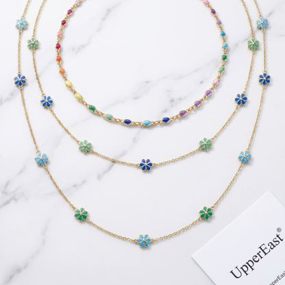 Choker Arcobaleno Multi-Stone Oro 18K - flat lay con pezzi coordinati - UpperEast Jewels