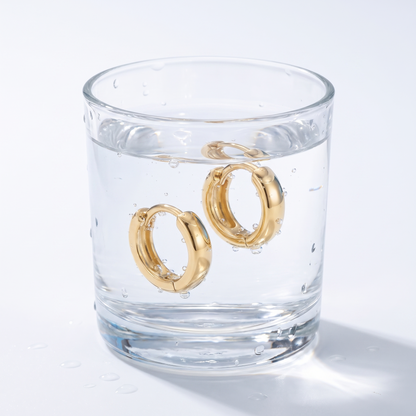 Orecchini Huggie Lisci Oro 18K