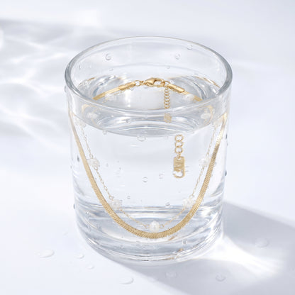 Cavigliera Snake Chain Oro 18K - test waterproof in acqua - UpperEast Jewels