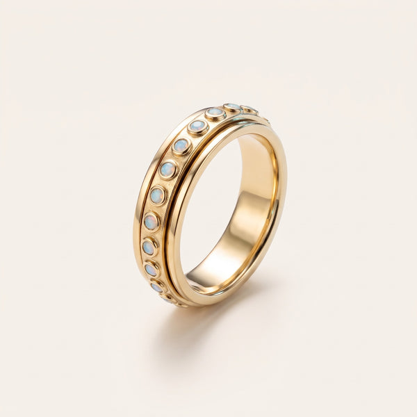 Anillo antiestrés giratorio bañado en oro de 18K
