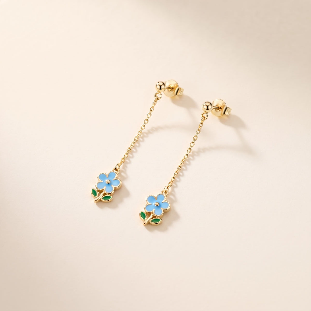 Orecchini goccia con fiore placcati oro 18K
