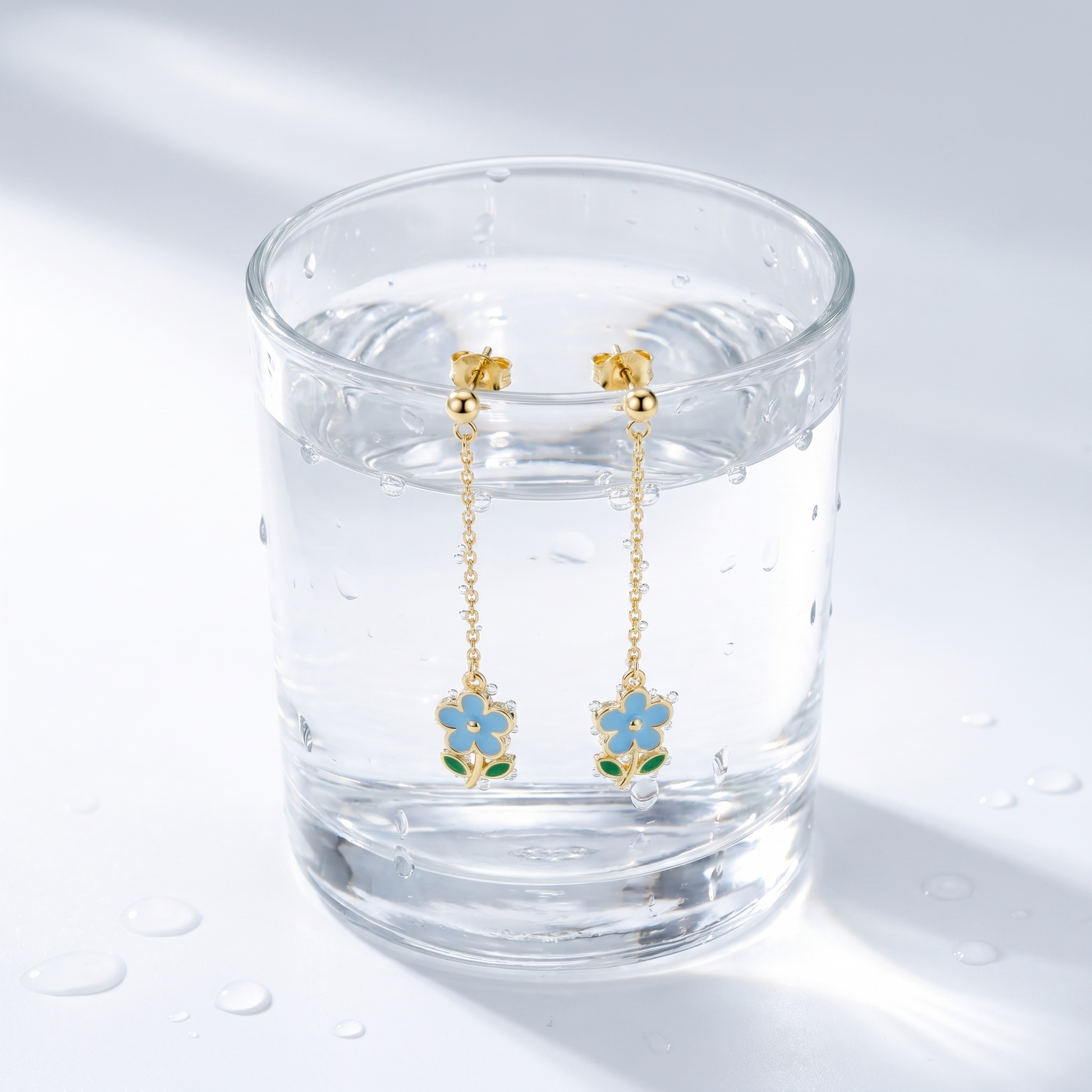 Orecchini Goccia Fiore Oro 18K — 09-stress-proof